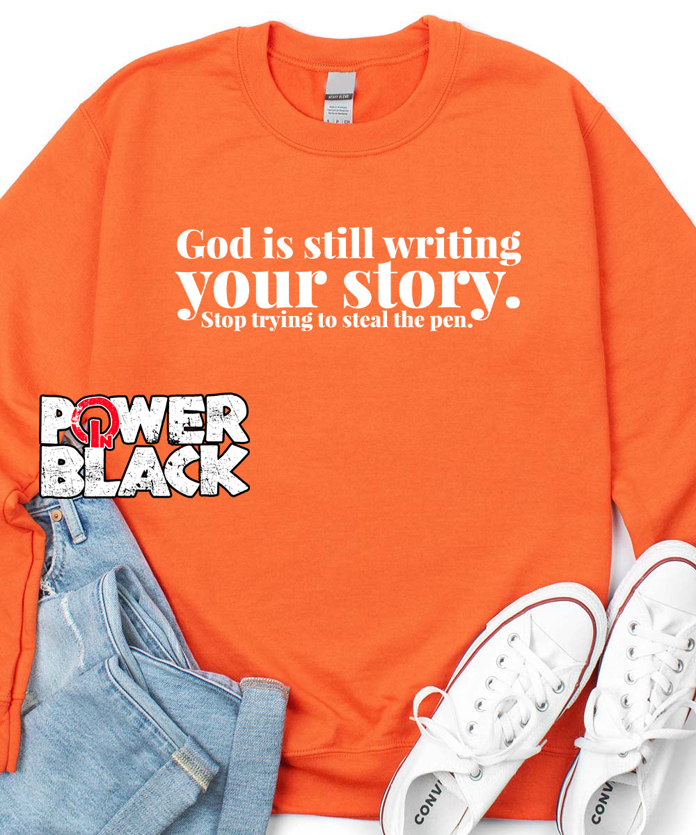 Orange sweatshirt store with black writing